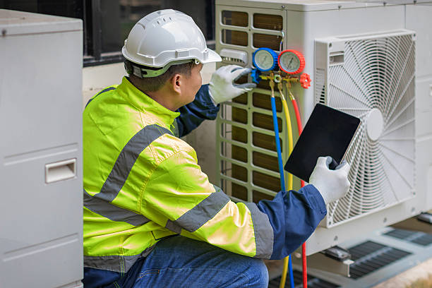 Professional Air Conditioning Repair technician working in Rhome, TX